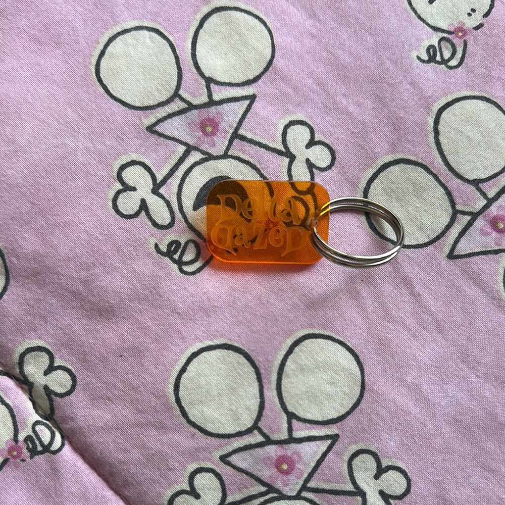 Orange Acrylic Keychain delta dazed